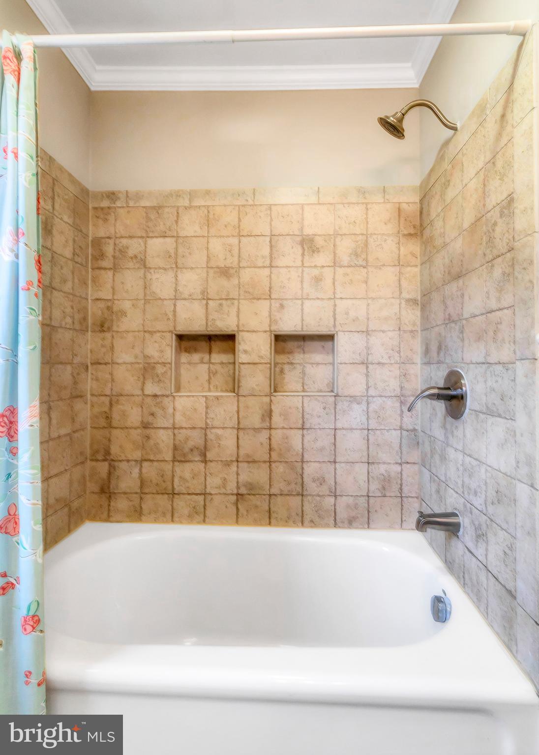 605 St Dunstans Road Baltimore, MD 21212 - Photo 31 of 43 a bathroom with a bathtub