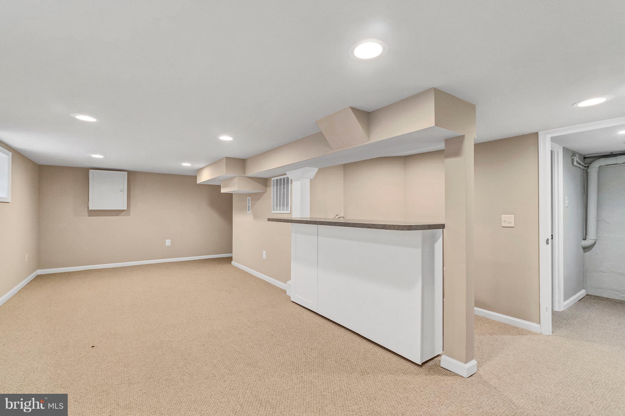 605 St Dunstans Road Baltimore, MD 21212 - Photo 35 of 43 an empty room with a empty space and wooden floor