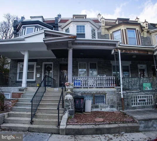 front view of a house with a small yard