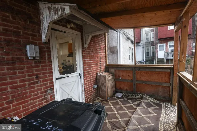 a kitchen with stainless steel appliances granite countertop a stove a sink and wooden cabinets