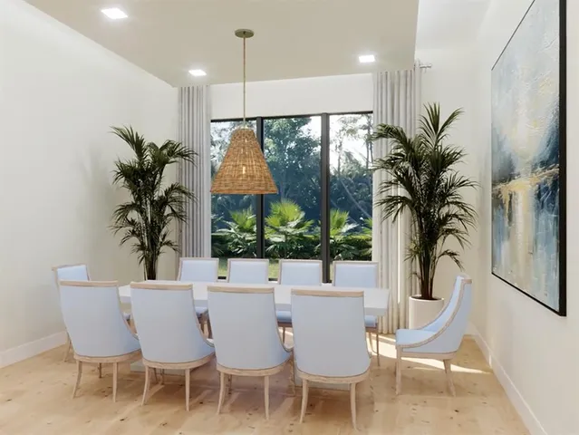 a room with a sink and a mirror