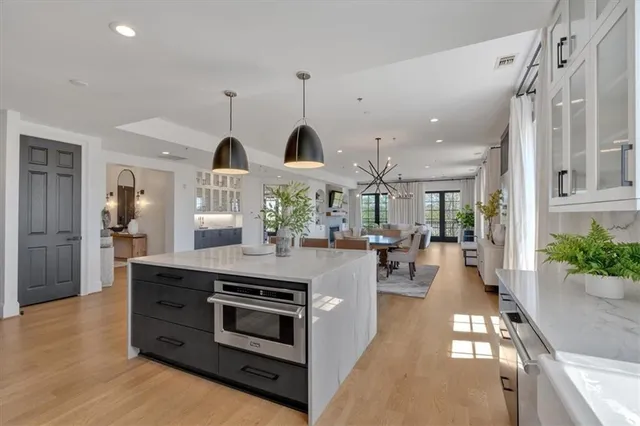 a living room with furniture fireplace and flat screen tv