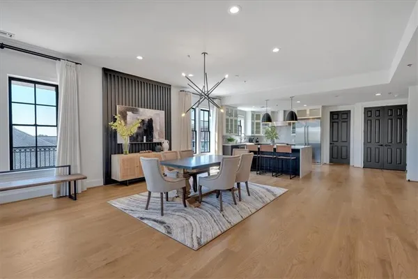 a spacious bedroom with a bed and window
