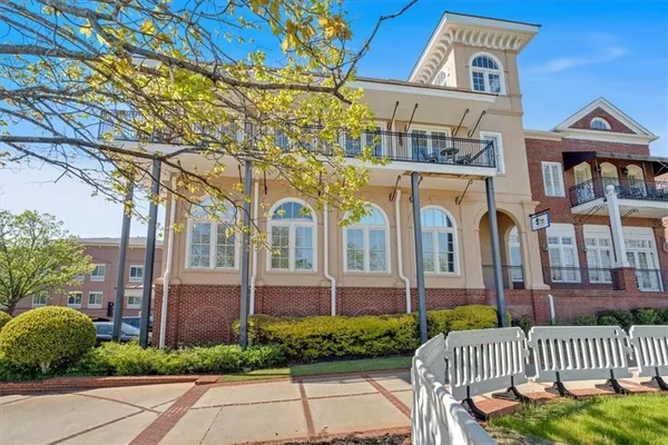 a front view of a building with street view