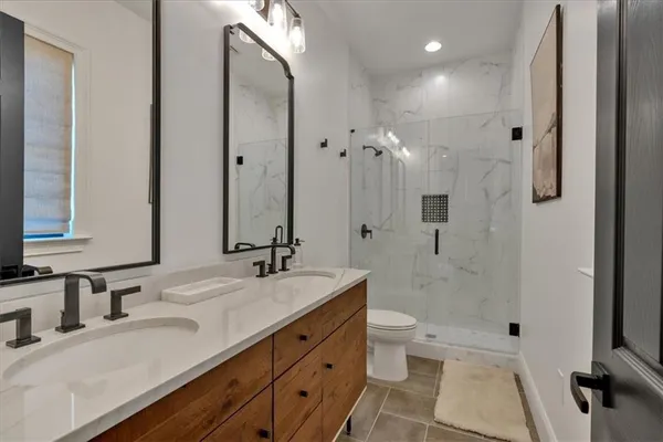 a view of a balcony with lake view and a city view