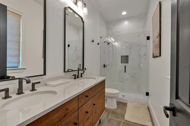 a view of a balcony with lake view and a city view