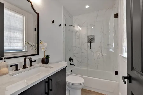 a view of balcony with furniture and city view