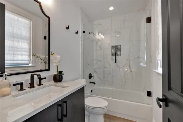 a view of balcony with furniture and city view