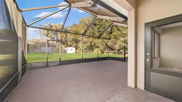 a view of an empty room with a balcony