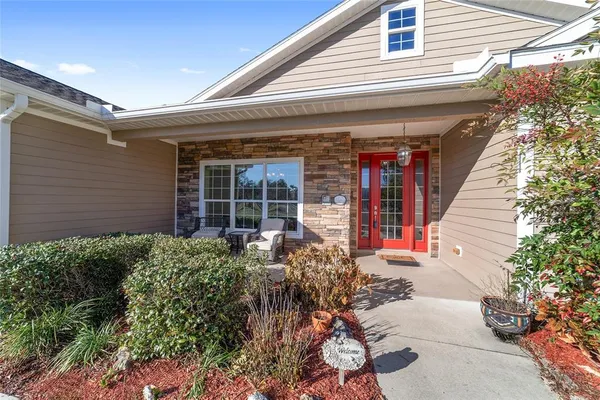 a view of a kitchen with a sink and a window