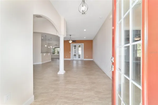a view of livingroom with hardwood floor and a ceiling fan
