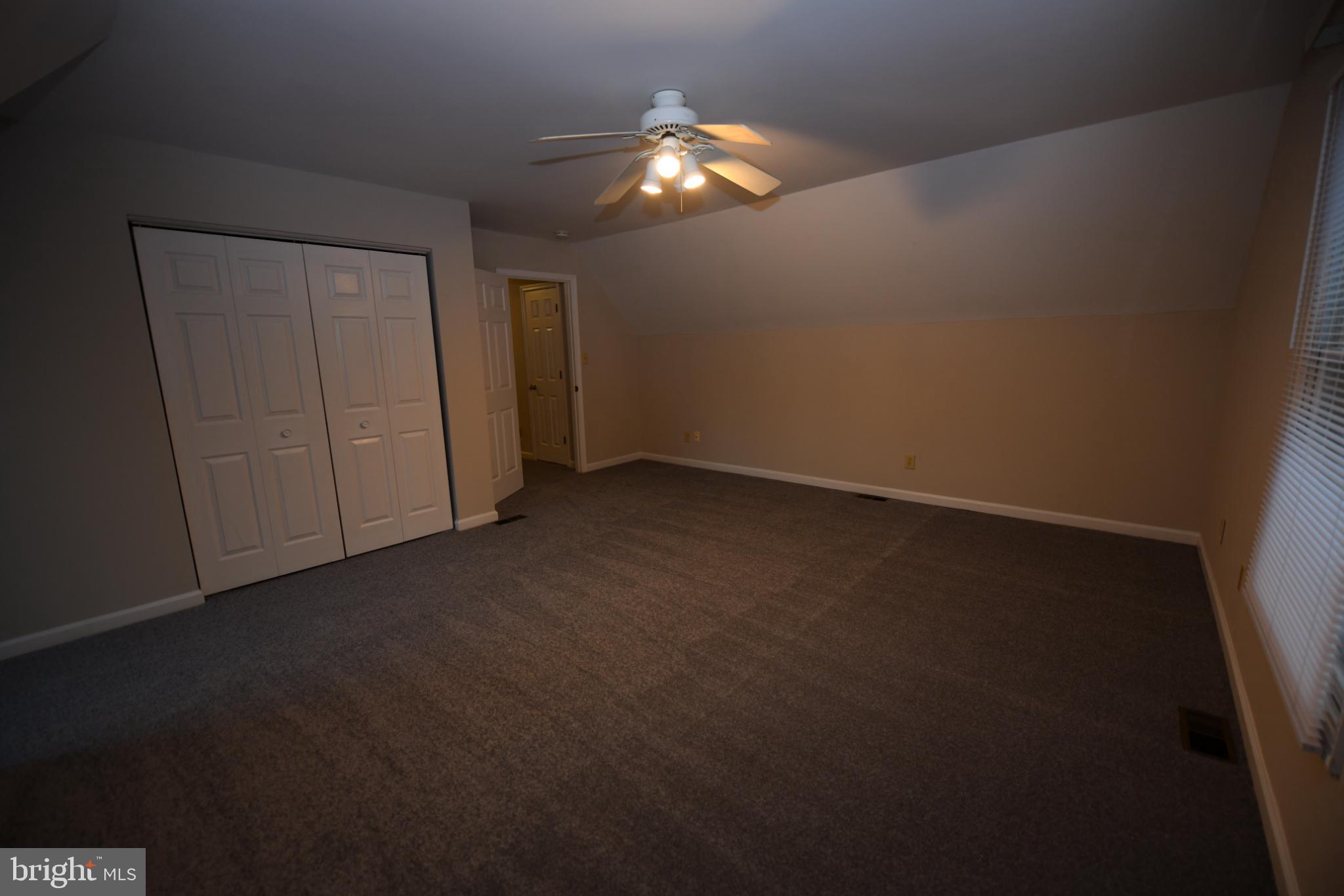 20503 Chestnut Ridge Drive Leonardtown, MD 20650 - Photo 26 of 36 a view of an empty room and chandelier fan
