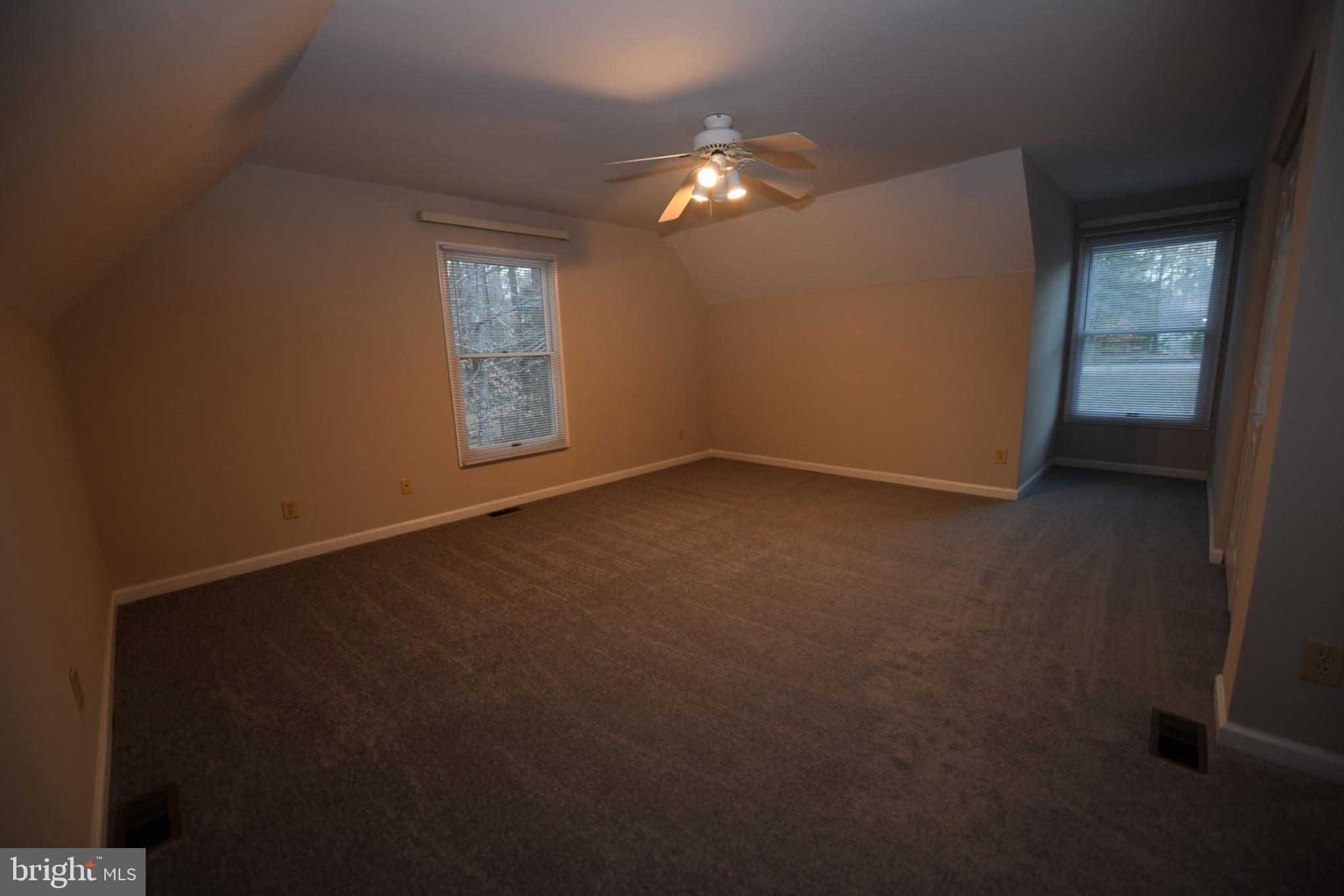 20503 Chestnut Ridge Drive Leonardtown, MD 20650 - Photo 27 of 36 a view of an empty room with window and chandelier fan
