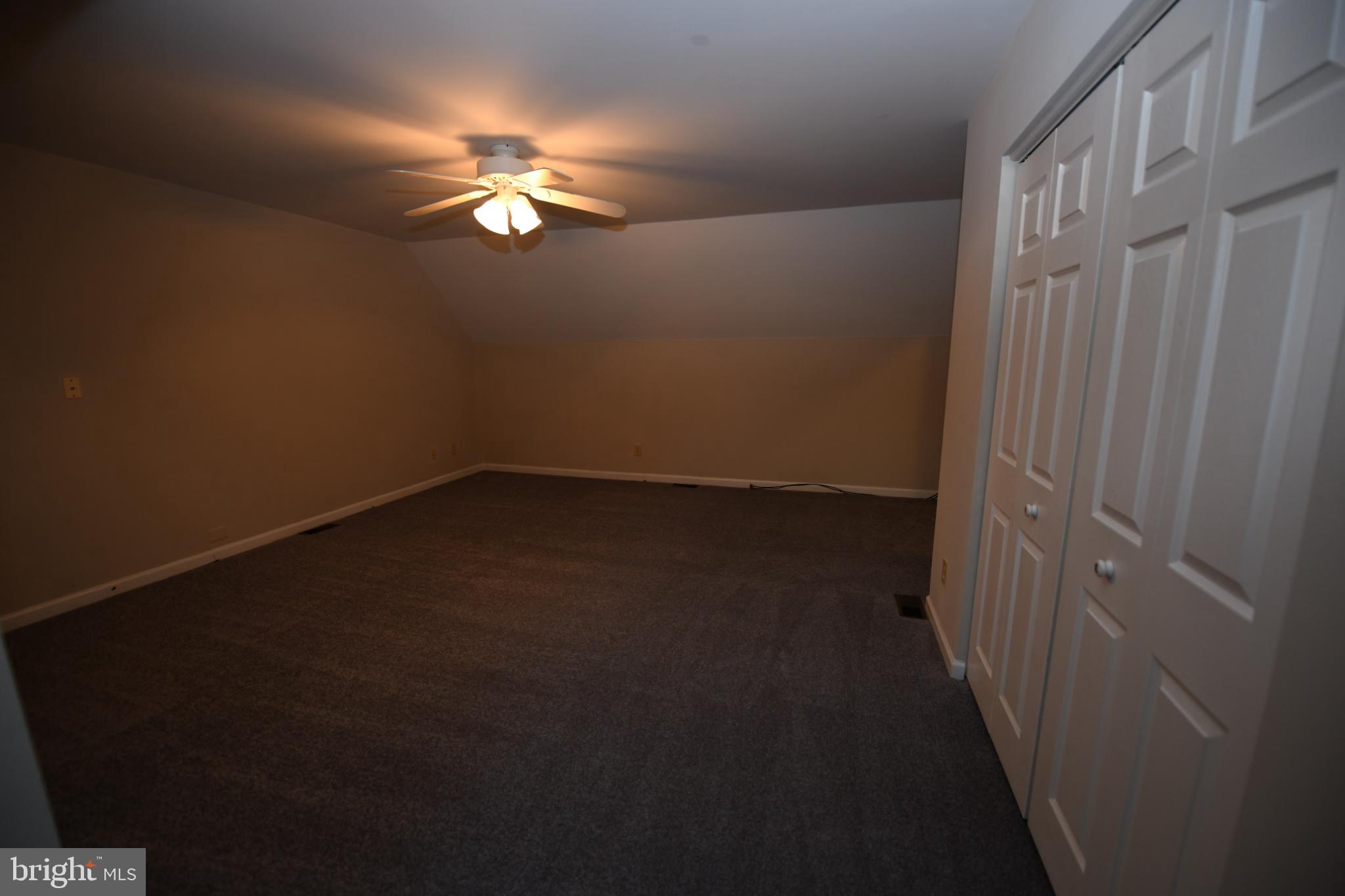 20503 Chestnut Ridge Drive Leonardtown, MD 20650 - Photo 33 of 36 a view of a livingroom with a fan