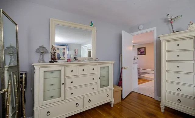a bathroom with a double vanity sink and mirror