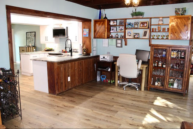 200 Lancaster Street Boca Raton, FL 33487 - Photo 15 of 43 a living room with a couch and a wooden floor