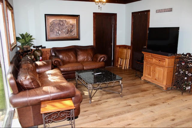 200 Lancaster Street Boca Raton, FL 33487 - Photo 16 of 43 a living room with furniture and a flat screen tv