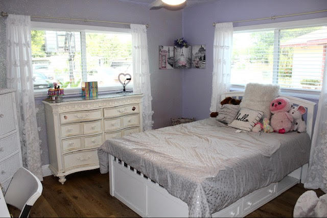 200 Lancaster Street Boca Raton, FL 33487 - Photo 35 of 43 a bedroom with a bed and a window