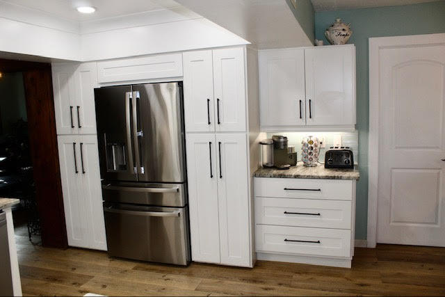 200 Lancaster Street Boca Raton, FL 33487 - Photo 5 of 43 a kitchen with appliances and cabinets
