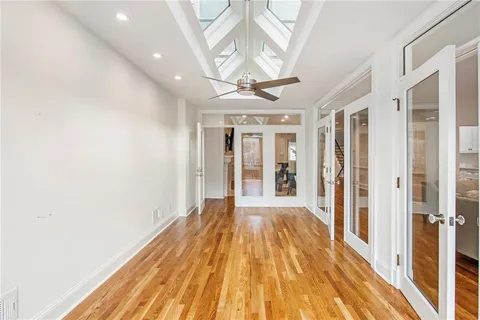 a view of entryway with wooden floor