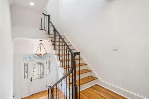a view of entryway with wooden floor