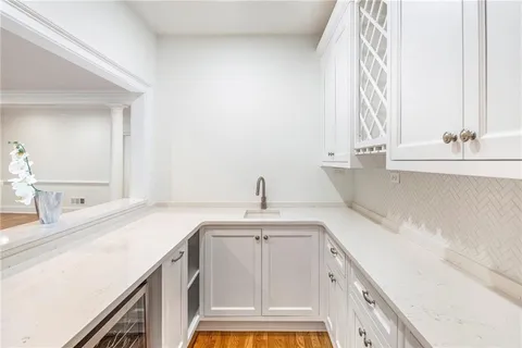 a kitchen with a sink and a window
