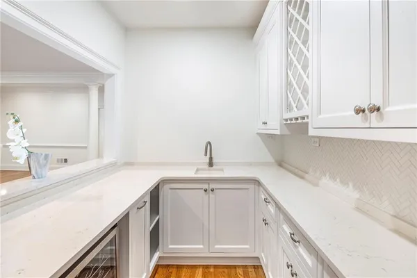 a kitchen with a sink and a window