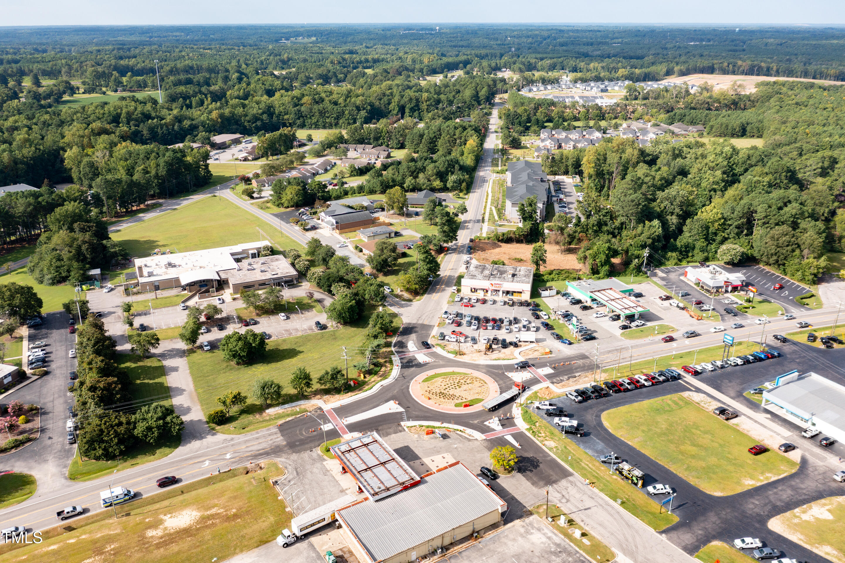 301 Pony Road Zebulon, NC 27597 - Photo 8 of 10 an aerial view of residential houses with outdoor space