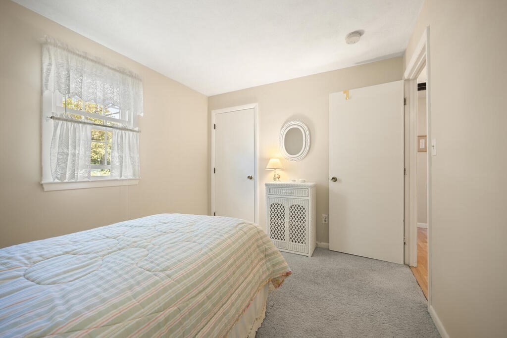 11 Rickey Drive Maynard, MA 01754 - Photo 16 of 29 a bedroom with a bed and a window