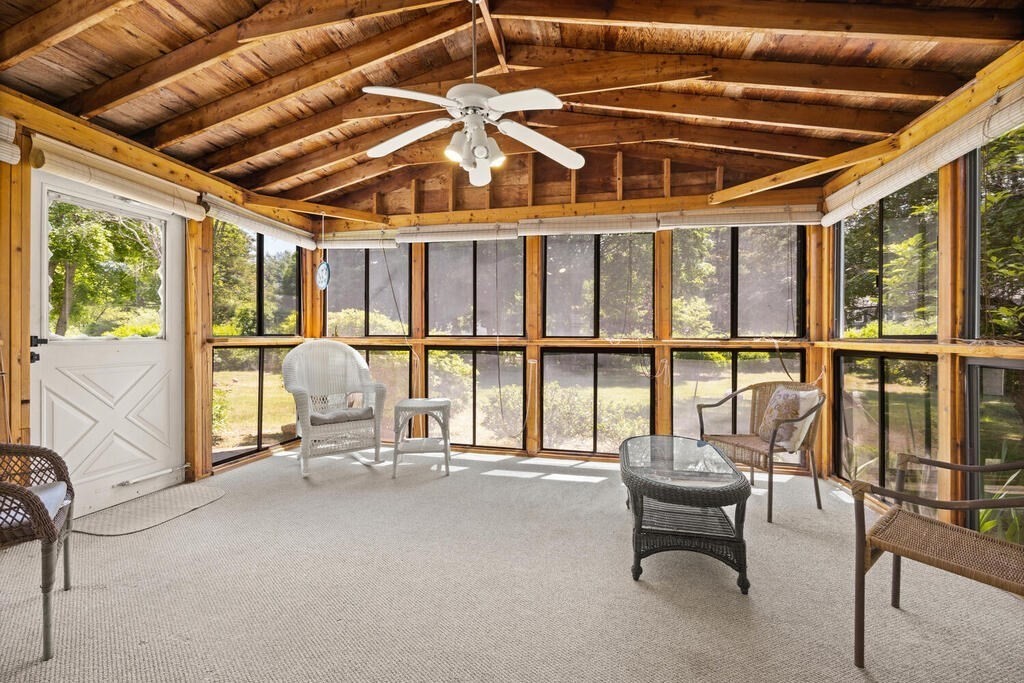11 Rickey Drive Maynard, MA 01754 - Photo 19 of 29 a view of a livingroom with furniture and floor to ceiling window