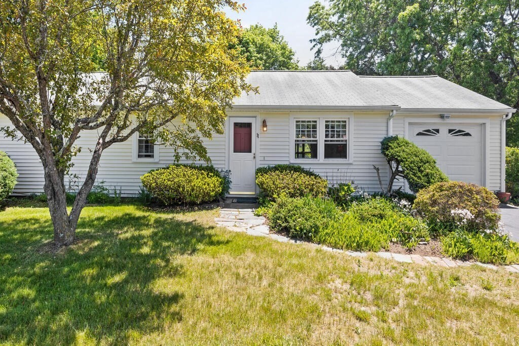 11 Rickey Drive Maynard, MA 01754 - Photo 2 of 29 a front view of a house with garden