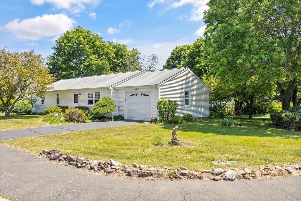 11 Rickey Drive Maynard, MA 01754 - Photo 21 of 29 a view of a house with swimming pool and a yard