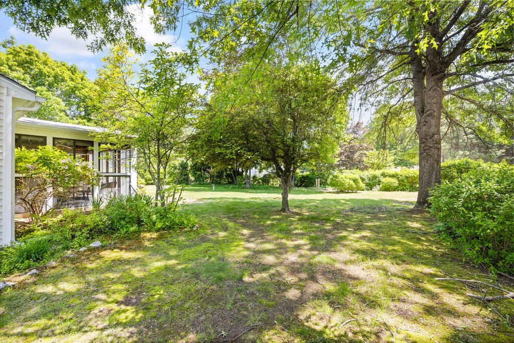 11 Rickey Drive Maynard, MA 01754 - Photo 24 of 29 a view of a yard with plants and trees