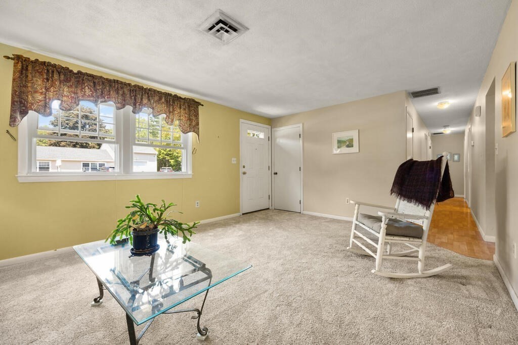11 Rickey Drive Maynard, MA 01754 - Photo 5 of 29 a workspace with furniture and a window