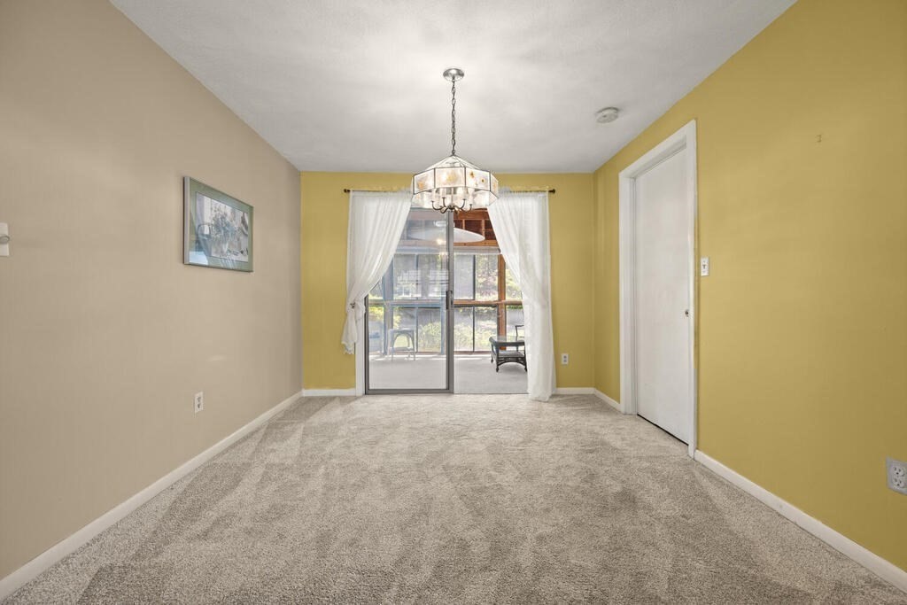 11 Rickey Drive Maynard, MA 01754 - Photo 6 of 29 a view of a bedroom with window and ceiling fan