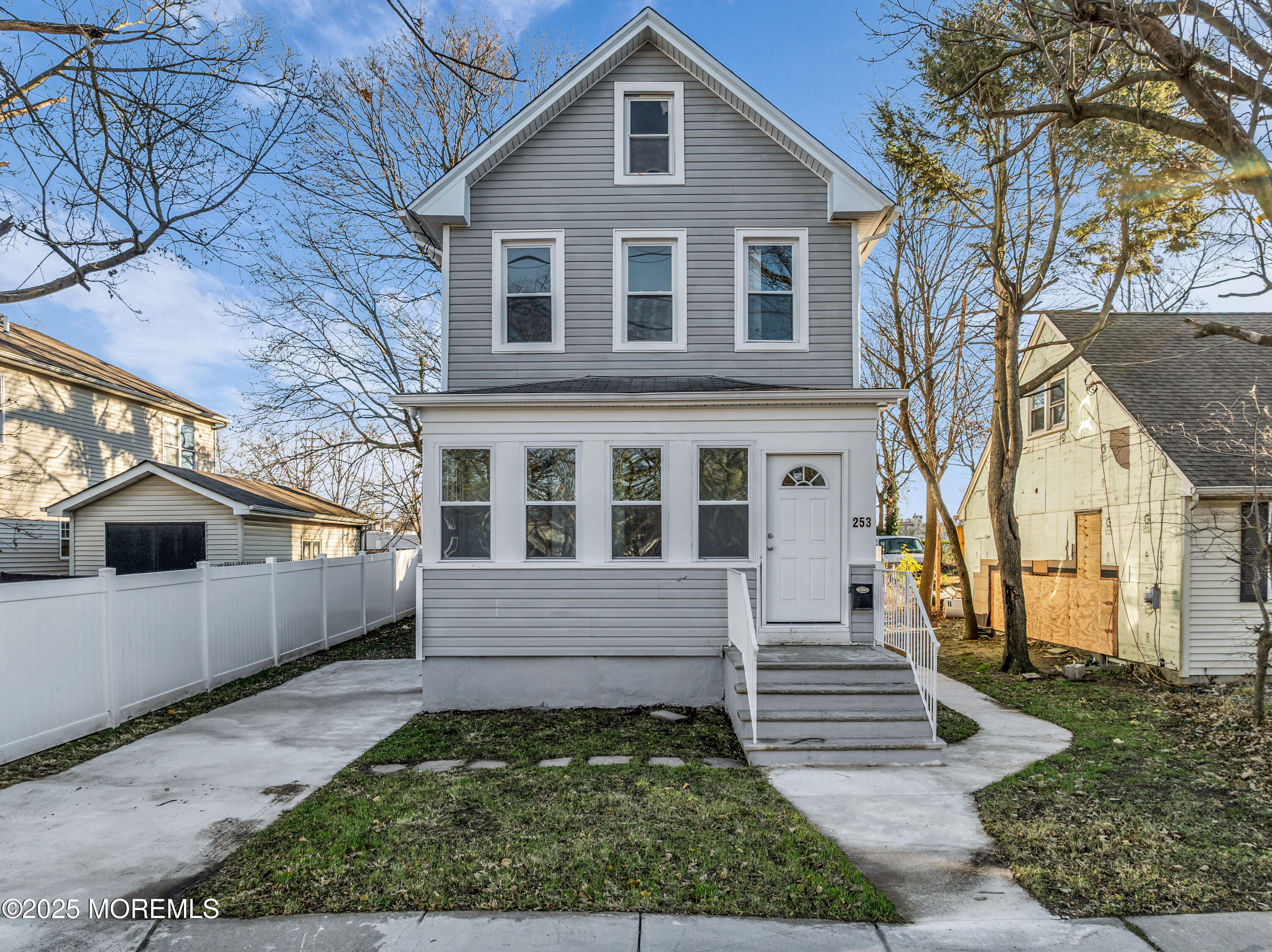 253 South Pearl Street, Unit B Red Bank, NJ 07701 - Photo 1 of 34 a front view of a house with a yard