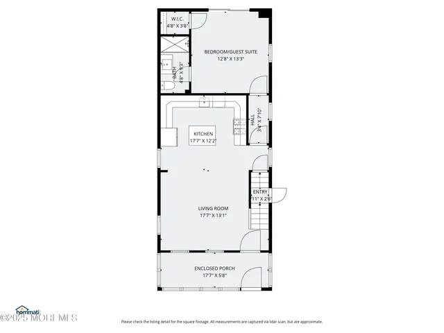 a picture of a bench in front of a wall