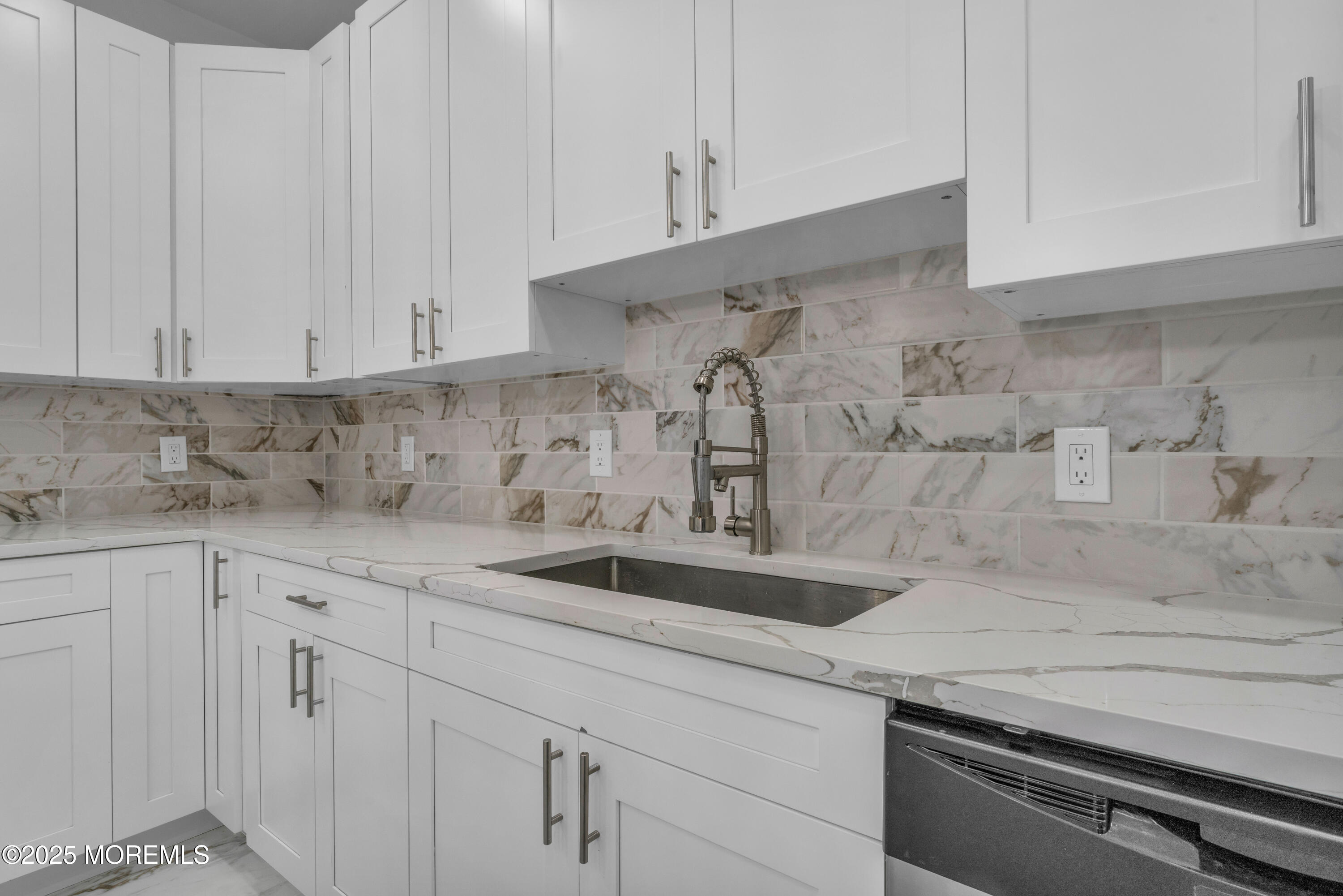 253 South Pearl Street, Unit B Red Bank, NJ 07701 - Photo 8 of 34 a kitchen with a sink and cabinets