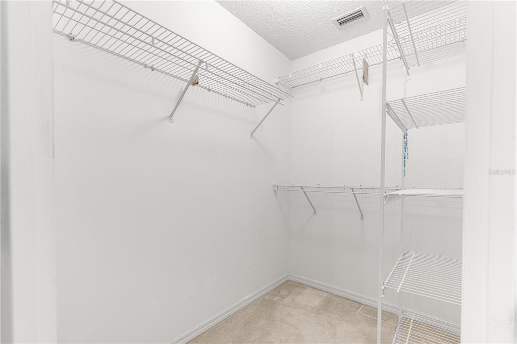 5312 Southwest 109th Place Road Ocala, FL 34476 - Photo 20 of 39 a view of a room with racks on the wall