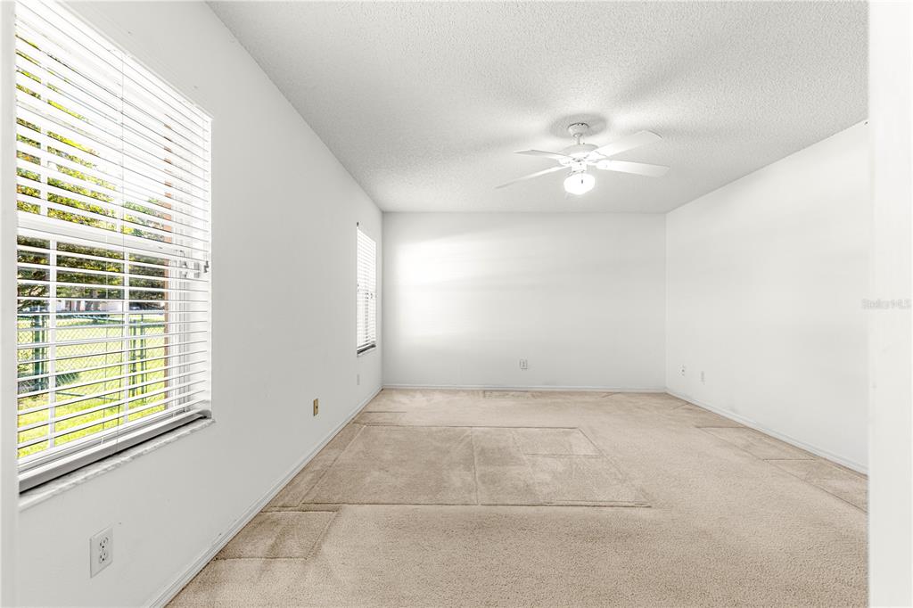 5312 Southwest 109th Place Road Ocala, FL 34476 - Photo 23 of 39 a view of an empty room with a window