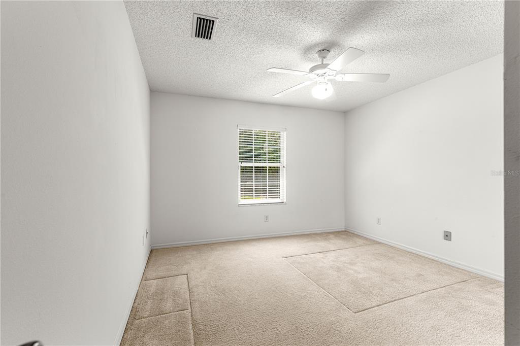 5312 Southwest 109th Place Road Ocala, FL 34476 - Photo 28 of 39 a view of an empty room with a window