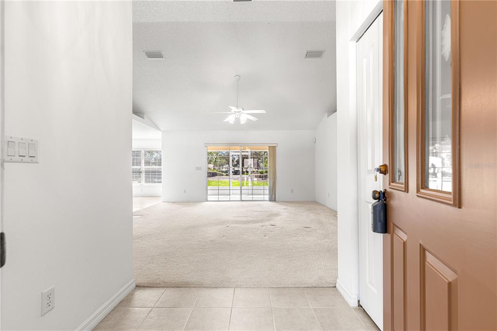 5312 Southwest 109th Place Road Ocala, FL 34476 - Photo 3 of 39 a view of an empty room with a window