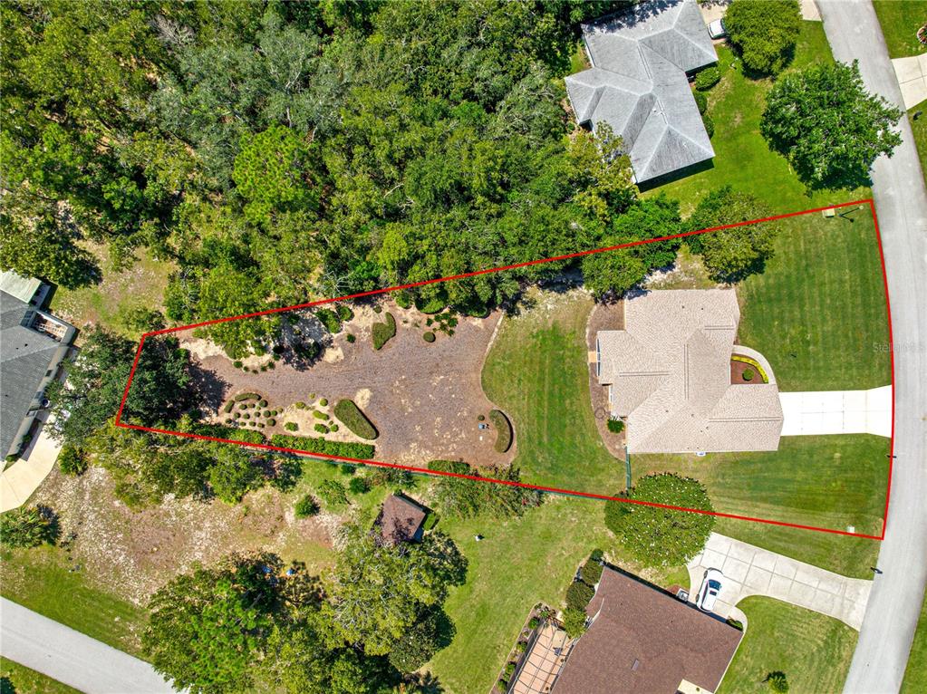 5312 Southwest 109th Place Road Ocala, FL 34476 - Photo 37 of 39 an aerial view of residential house with yard and swimming pool