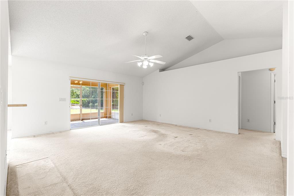 5312 Southwest 109th Place Road Ocala, FL 34476 - Photo 7 of 39 a view of an empty room with a window