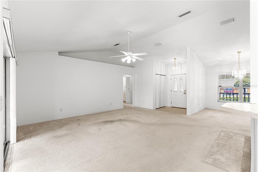 5312 Southwest 109th Place Road Ocala, FL 34476 - Photo 9 of 39 an empty room with a empty space and windows