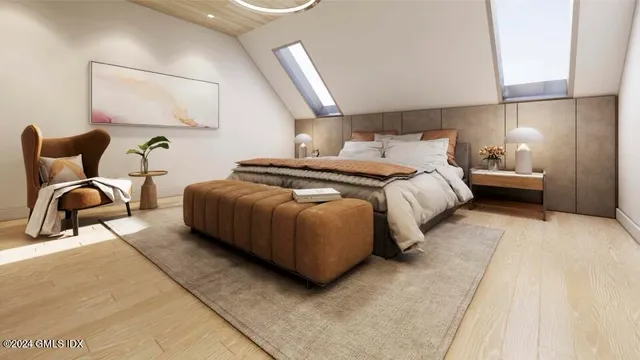 a bedroom with bed and lamp