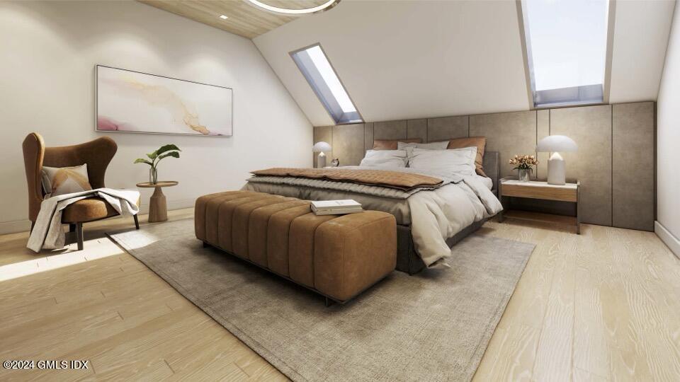 59 Locust Street, Unit A Greenwich, CT 06830 - Photo 17 of 24 a bedroom with bed and lamp