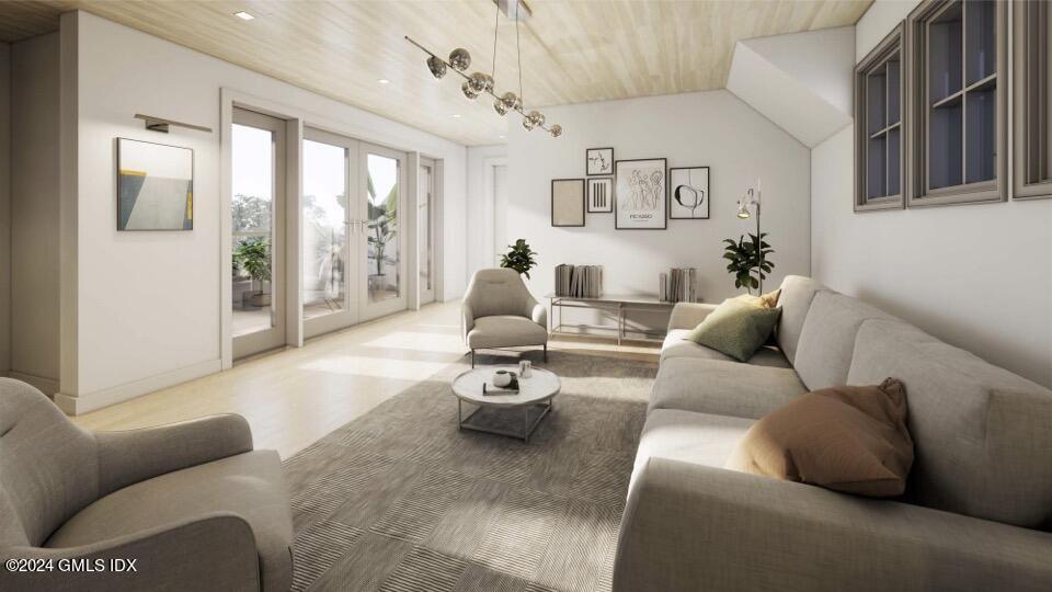 59 Locust Street, Unit A Greenwich, CT 06830 - Photo 18 of 24 a living room with furniture and a large window