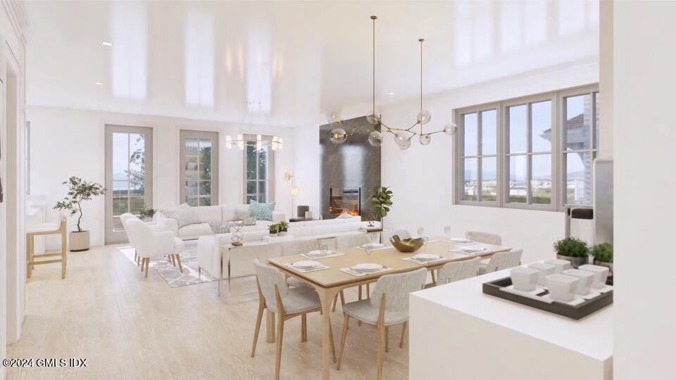 59 Locust Street, Unit A Greenwich, CT 06830 - Photo 8 of 24 a dining room with furniture and window
