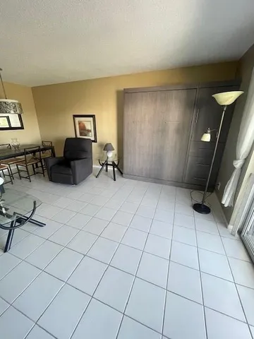 a view of a livingroom with furniture and a couch